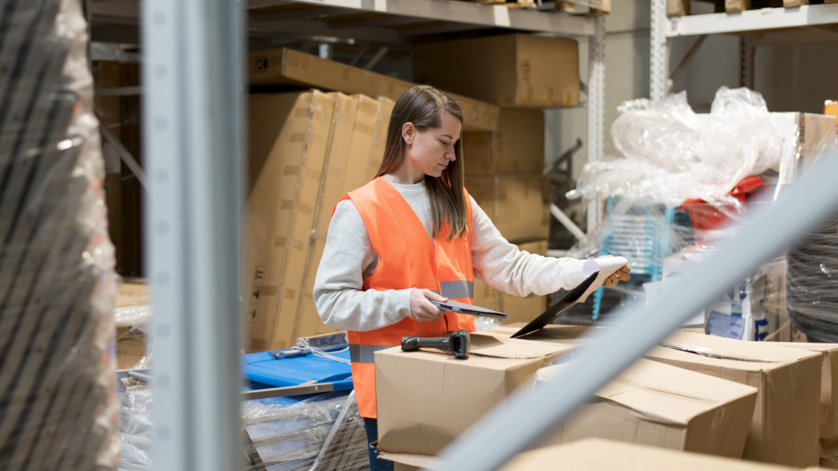 medium-shot-woman-checking-document